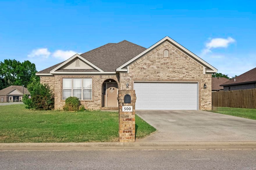 Welcome to comfortable living in the desirable Ridgewood Subdivision on the west side of town, not far away from the prestigious Searcy Country Club and Westside Elementary. Nestled in a tranquil neighborhood, this 3-bedroom, 2-bathroom home offers the perfect blend of convenience and serenity. Upon entering, you're greeted by a thoughtfully designed split floor plan, providing privacy and functionality for families and guests alike. Laminate flooring flows seamlessly through the living areas, creating a warm and inviting atmosphere. The heart of the home is the spacious eat-in kitchen, featuring a center island and abundant cabinets for all your storage needs. Whether you're hosting intimate gatherings or preparing family meals, this kitchen is sure to inspire your culinary adventures. Retreat to the master suite, boasting elegant tray ceilings, a large walk-in closet, and an ensuite bathroom complete with double sinks, a separate tub, and a shower. Outside, you'll find a a fenced, oversized, corner lot back yard with plenty of space for outdoor activities or simply enjoying the peaceful surroundings. Square footage approximate, please measure.