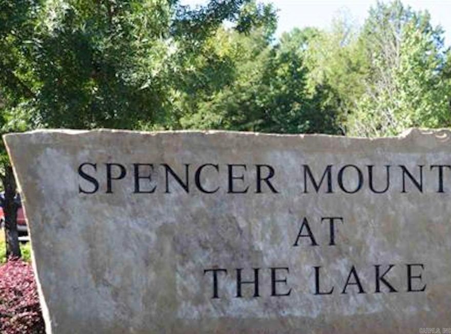 Don't miss out on one of the last lots in Spencer Mountain at the Lake subdivision! Build your dream home in this sought-after neighborhood surrounded by beautiful trees and just steps away from the lake. This is the perfect opportunity to create the home you've always envisioned in a serene and picturesque setting. Contact us today to secure your spot in this coveted subdivision.