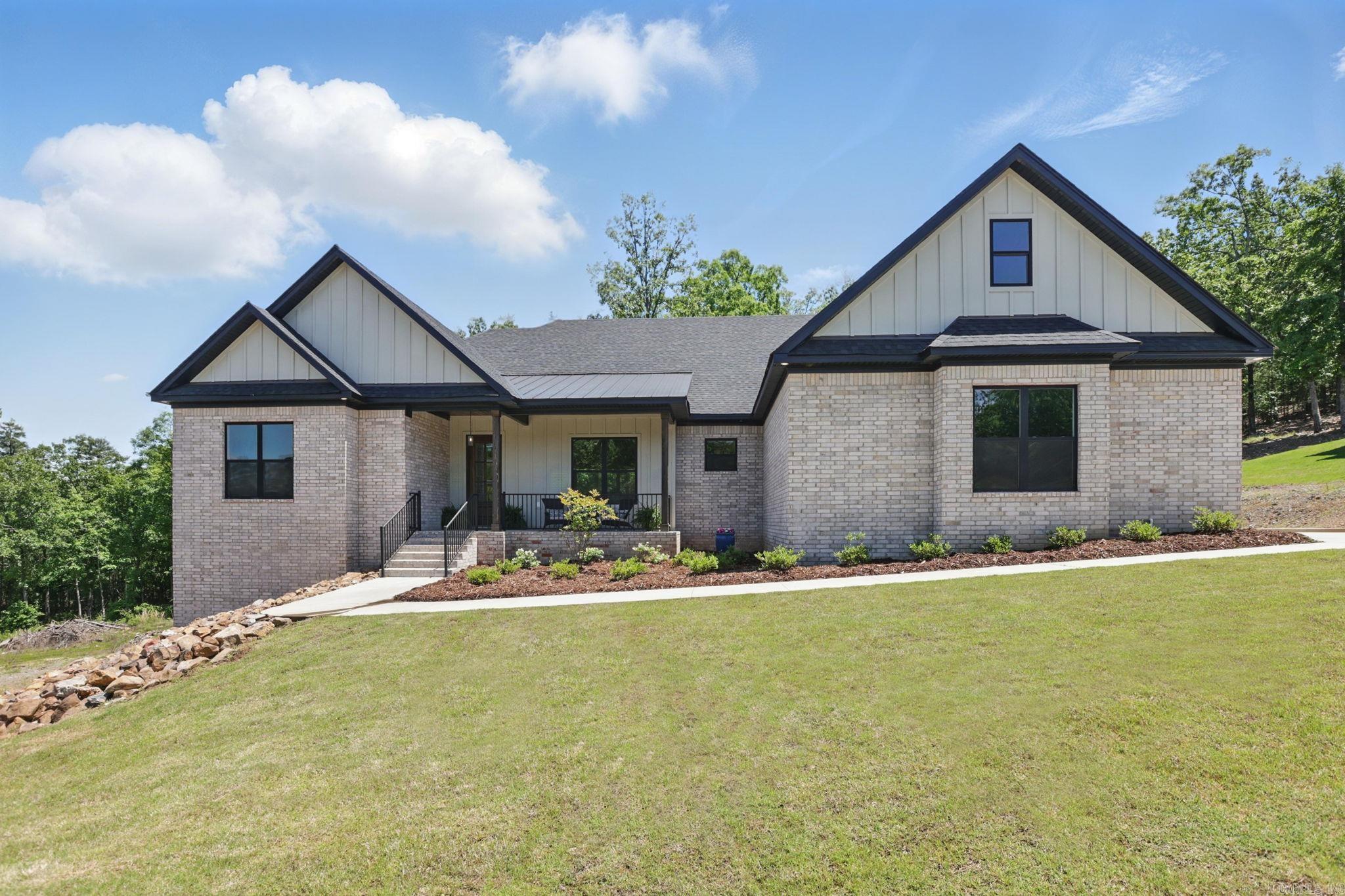 PREVIOUSLY OVERPRICED & NOW PRICE TO SELL! Tranquility+modern comforts in Waterview Estates. NEW CONSTRUCTION contemporary-meets-craftman home designed with quality finishes & an interior offering a seamless flow that marries luxury with comfort. The gourmet Kitchen is fitted with state-of-the-art appliances and includes a gigantic Walk-In Pantry ROOM. Retreat to the Master Suite, a sanctuary with ample space and a Spa-like Bathroom with an incredible Boutique-Sized Closet. 3 additional Bedrooms + 2.5 Baths provide comfort and flexibility for family or guests, while the versatile upstairs Bonus Room can easily adapt to an oversized office or game room. Greet friends on the lovely front porch & entertain on expansive deck, perfect for soaking in the serene wooded Green Space. With its perfect balance of seclusion & convenience, this property is a remarkable find for those seeking a harmonious lifestyle steeped in nature's beauty. Neighborhood offerings: miles of trails, a soccer field, tennis/pickleball courts & a bonfire area. 7 minutes to shopping/schools. Call for your showing today!