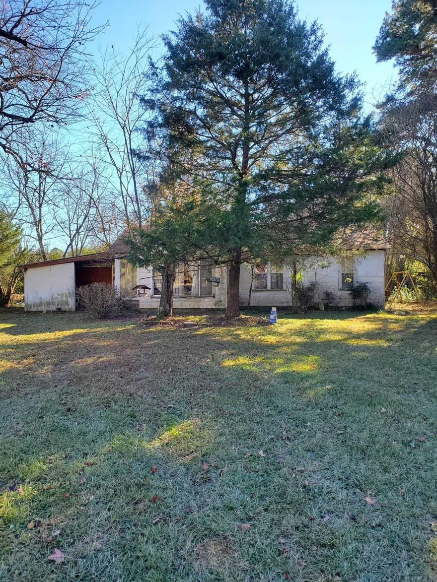 Older home just a short distance outside of Mena off Highway 8 West.  2.9 acres of level land, about 2/3 with good fencing and good grass.  The home has 3 bedrooms and 1 bath contained in over 1500 square feet.  Bonus rooms.  It needs work, TLC, and cleanup inside and out.  Buy this and become a do-it-yourselfer - you shoiuld like the final result.