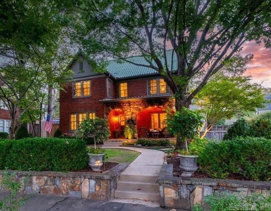 Classic home on one of Hillcrest’s prettiest streets. This iconic brick, rock and stucco home features an original green tile roof, 9’ ceilings, arched doorways, hardwood floors, artisan custom screen doors, and new Pella windows throughout (2023). Main level: Living Room w fireplace, Dining Room w custom built-in China hutch (2017). Powder Room remodeled in 2018. Kitchen remodeled in 2019 w Kitchen-Aid SS appliances, new cabinets, solid surface countertops and pantry. Cozy Den, Mud Room and Laundry Room also on main level. Upstairs: Primary Suite w elegant bath and closet, gorgeous designer wallpaper, soaking tub, separate shower and private balcony (new in 2023). Additional Two Bedrooms and Bath in excellent condition. Third floor features Playroom/teen Bonus room that could be 4th Bedroom. Immaculately maintained w new HVAC (2020). Fantastic backyard w custom rockwork, landscaping, including rock planting beds, raised gardens, and flagstone patio. New exterior paint (2017). Guest House (separate address and utilities) above garage remodeled in 2018 w custom finishes. Quintessential Hillcrest Beauty has it ALL!