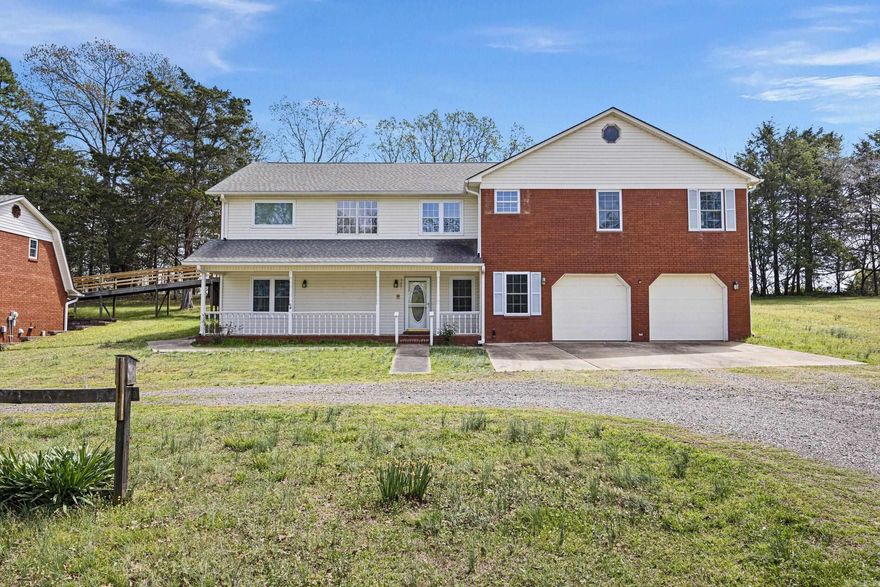 Welcome to this stunning lakefront property, offering a rare investment opportunity in a serene and picturesque setting. Nestled on 3.46 acres of lush land, this property features two beautifully maintained homes, providing a total of 8 spacious bedrooms and 5 well-appointed bathrooms, perfect for large families, guests, or multi-generational living. The main attraction is the breathtaking lakefront, where you can enjoy serene views and the tranquility of nature right at your doorstep. A seasonal pond adds an extra touch of charm to the landscape, enhancing the overall beauty and appeal of the property. Whether you're seeking a move-in ready home or looking for a prime investment, this property has it all!