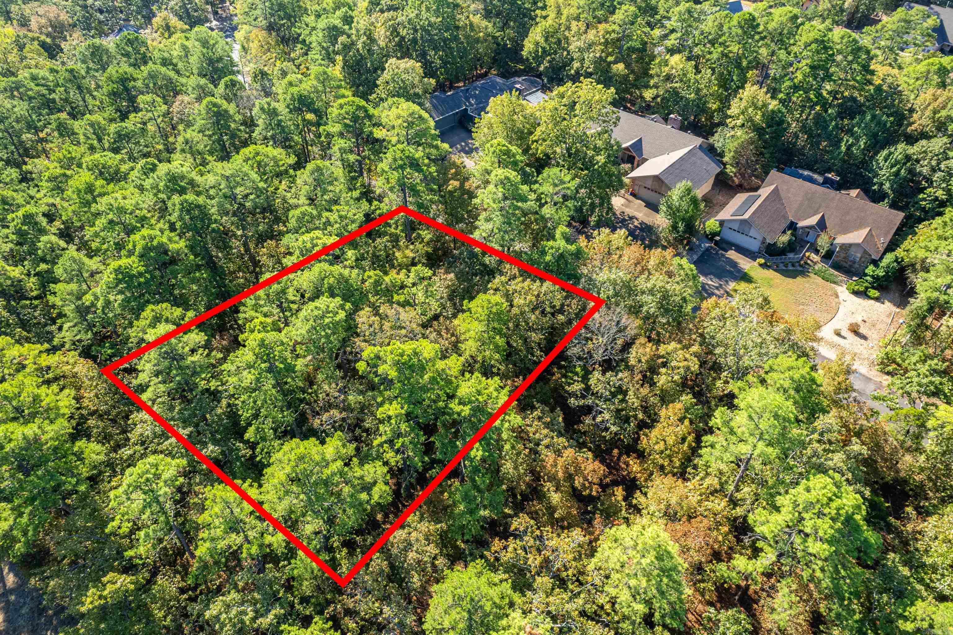 Don't miss the chance to secure your slice of paradise in Hot Springs Village. Embrace the opportunity to build the home you've always dreamed of in a location that shows off the best of Arkansas' natural beauty in North America's largest gated community. Your dream home awaits on this great lot, minutes from Ponce De Leon, Magellan, Diamanté and Granada Golf Courses. For more info on HSV go to www.explorethevillage.com. Hot Springs Village Property Owner Association has a new member buy-in fee of $250.00.