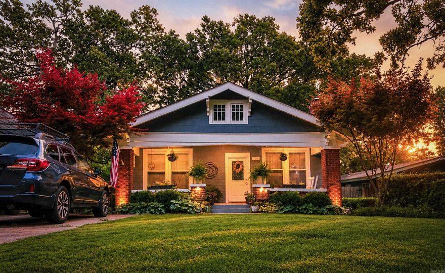 Come home to this charming Craftsman bungalow in the heart of Park Hill—thoughtfully updated and move-in ready. 9-foot ceilings throughout and abundant natural light in every room create an open, airy space that makes the home feel larger than expected. Original hardwood floors add warmth and timeless character, complementing the bright, open layout. The wood-burning fireplace will keep you cozy in cooler months.  The recently renovated bathroom brings a clean, modern touch, while the well-maintained interior makes this home truly turnkey. Step outside to a backyard designed for entertaining and everyday enjoyment, featuring a poured patio, pergola, and a fully equipped outdoor kitchen—ideal for gatherings year-round. A fully fenced yard adds privacy and functionality for pets, play, or relaxing evenings at home. Major updates provide peace of mind, including a newer roof (2018), exterior paint (2018), and water heater (2023). Additional features include a sprinkler system and storage shed for added convenience. Located in one of North Little Rock’s most desirable neighborhoods, this home blends character, thoughtful updates, and exceptional indoor-outdoor living.