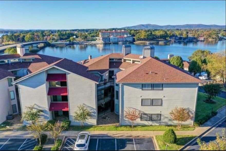 A rare gem that is priced to sell. Perched on the tranquil shores of Lake Hamilton. This immaculate upper-level condo is a masterpiece of comfort and charm. With elevator access, stunning water views and your very own boat dock, this property is a sanctuary for relaxation and adventure. Whether you envision it as your permanent residence or an income-generating short-term rental, it comes fully furnished and ready to welcome you! This stunning property offers exclusive access to top-tier amenities, including a sparkling swimming pool, a stylish clubhouse for gatherings, a relaxing hot tub, and a rejuvenating sauna.  Unwinding after a long day or entertaining guests, this community is designed for comfort, luxury, and everyday relaxation. Don't wait to make it yours! Call today to schedule your private showing.