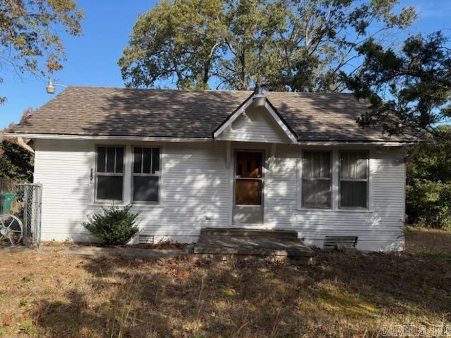 Four bedrooms and 1.5 bathrooms on two parcels totaling 1.10 acres with fresh exterior paint, new electric meter, flooring and roof 10/2025. HVAC 2004. Water heater 1999. No seller's disclosure. Sold "AS IS".