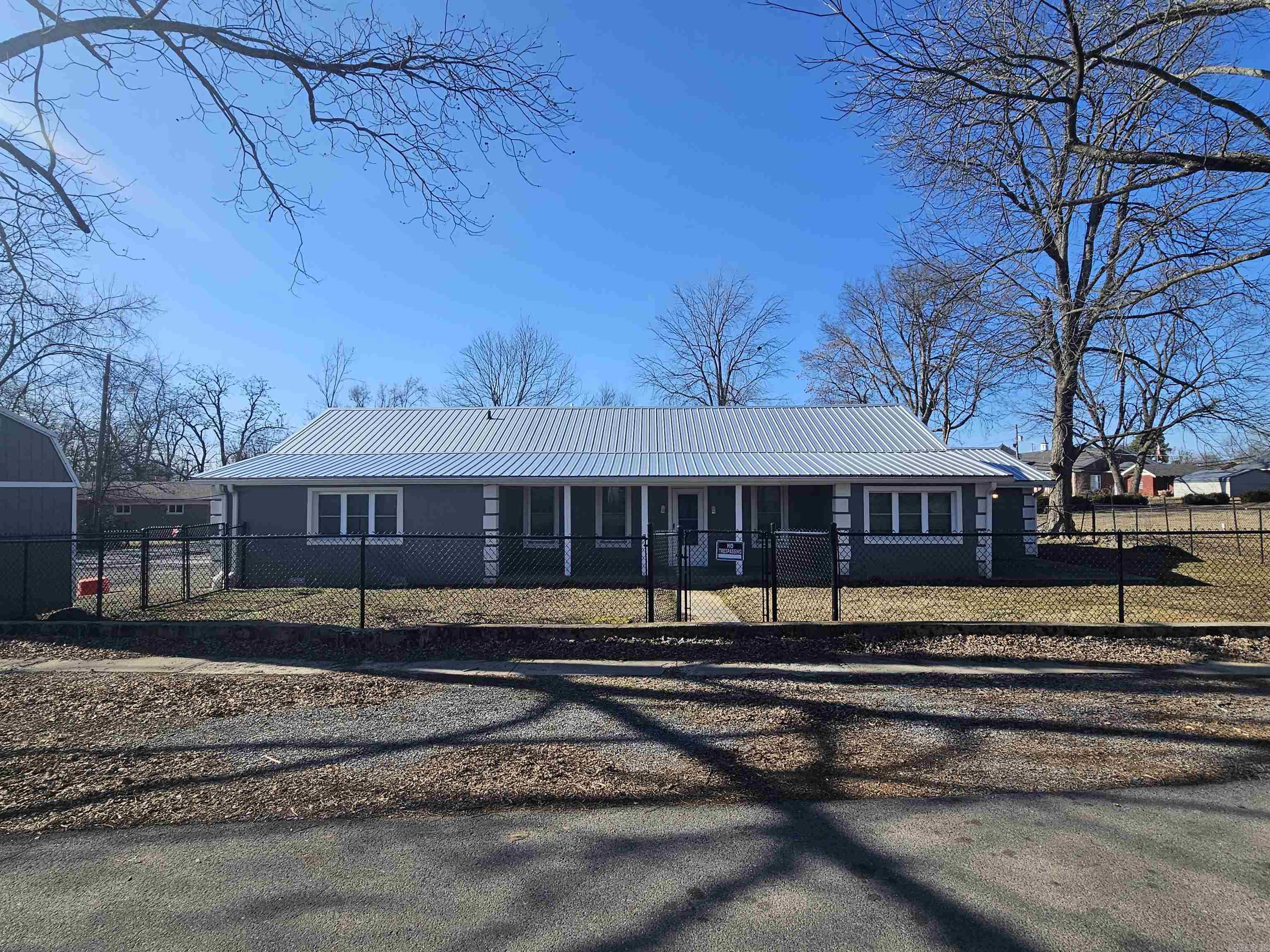 Move-in ready & full of charm! This bright, happy 4BR/2BA home in Marshall, AR, sits in a quiet neighborhood just a short walk to the library & elementary school. Enjoy a new metal roof, new laminate flooring, PEX plumbing, new wiring, new furnace, & hot water heater. The spacious layout includes space for a gas cook stove, breakfast nook, large dining room, gas fireplace, textured walls, & surround sound throughout. Stucco exterior, fenced yard, & large front porch add to the appeal. Just minutes from the Buffalo National River, this home is perfect for comfortable living or a nightly rental!