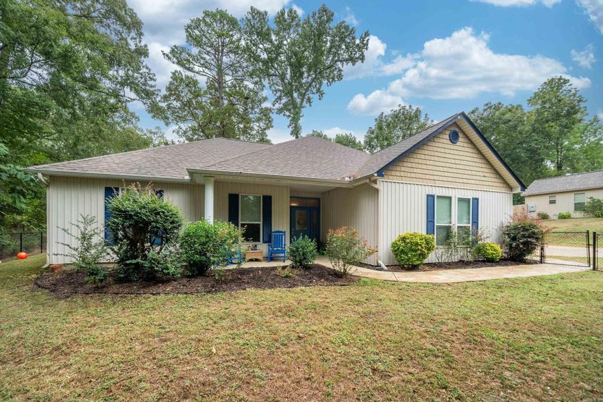Offered by Lake Hamilton Realty, Inc--Lovely, Secluded Home with All Electric Modern, Updates and is only 1 Block from Lake Hamilton--New Luxury Vinyl in Primary BR 2023, New with Remote Window Blinds--New Tile in 2022, New Carpet in 2021, Water Heater in 2022--New Lighting, Smart Thermostat, Patio Fans w/ remotes on Patio have All been added--All appliances convey except Trash Compactor & Fridge--Washer/ Dryer Convey--Gutters installed front & Back--Rust Free Front and Back Fence--Crown Molding and Interior Paint...Beautiful, Immaculate Home!!!