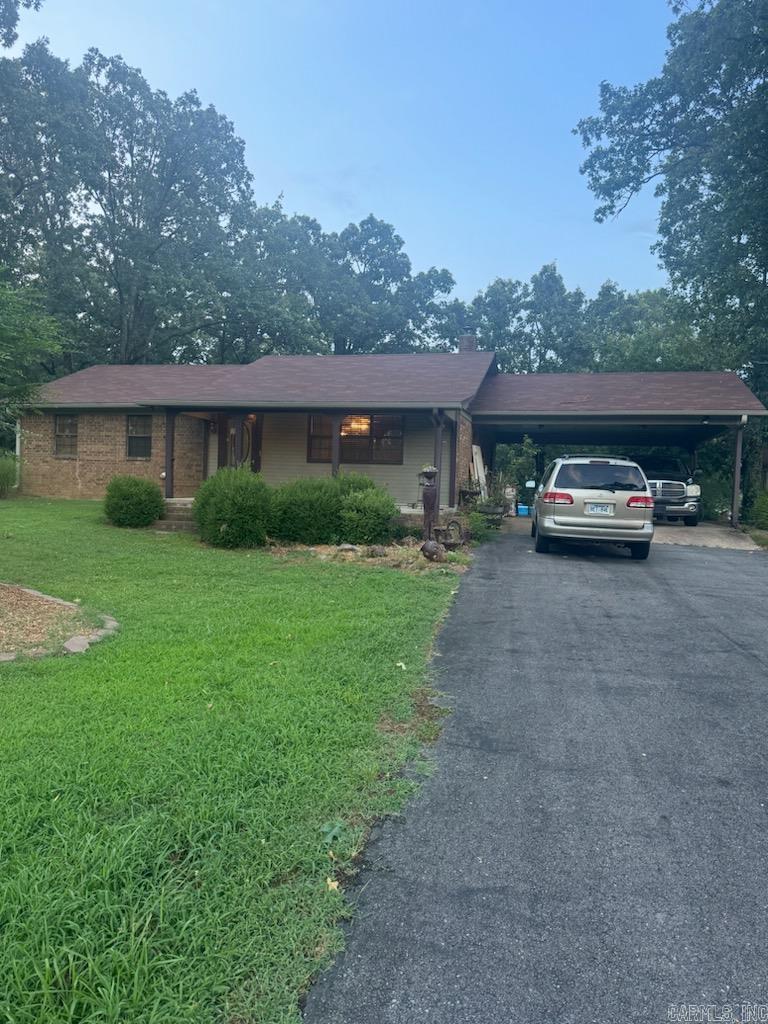 A little bit of country across the street from the city limits of Searcy. Close to schools and shopping. Nice 2 bedroom, 1 bath with extra large living room, nice sized kitchen with oak cabinets and granite countertops and a new dishwasher. Both bedrooms are extra large and have walk in closets. The bathroom has a new toilet and nice, updated walk-in shower. Laundry is in the bathroom. Home has been completely painted and the whole house flooring has been replaced with nice laminate flooring. A 30ā x 50ā shop with central heat and air and a bathroom. Perfect for home business or existing business. Large corner, 1.67 acres and is currently in 2 parcels so corner lot could be sold.
