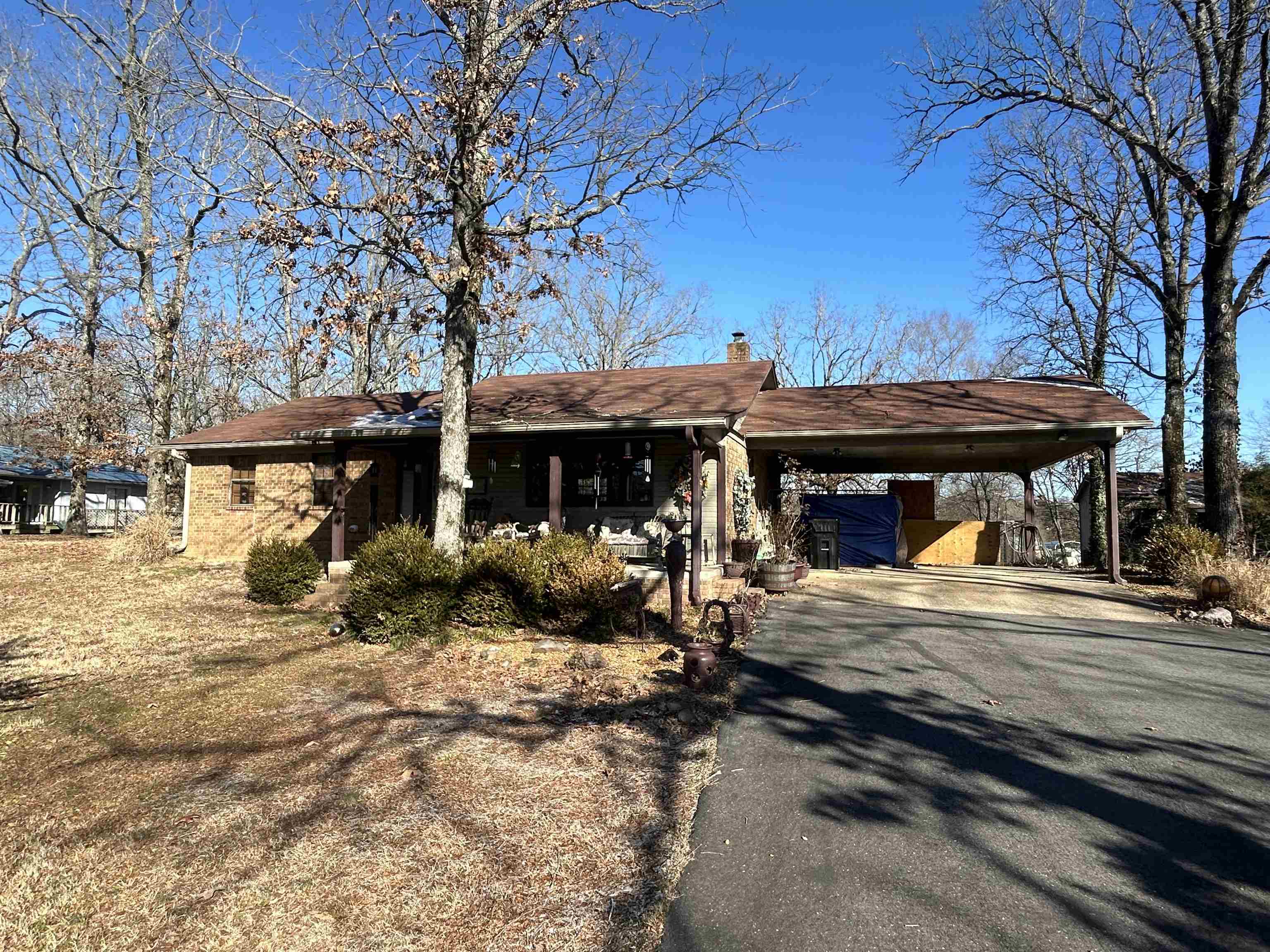 Great starter home or retirement home, 2 bedrooms, 1 bath with laundry room, large living room, does have flue for wood stove but no stove is there now, granite countertops in kitchen. Nice home ready to move into. There is an extra storage building plus a large 30x50 shop with central heat and air and a bathroom, walk through door and an overhead door. The lot has two parcels and you could sell off the corner lot if you didn't want that much land. Take a look today!