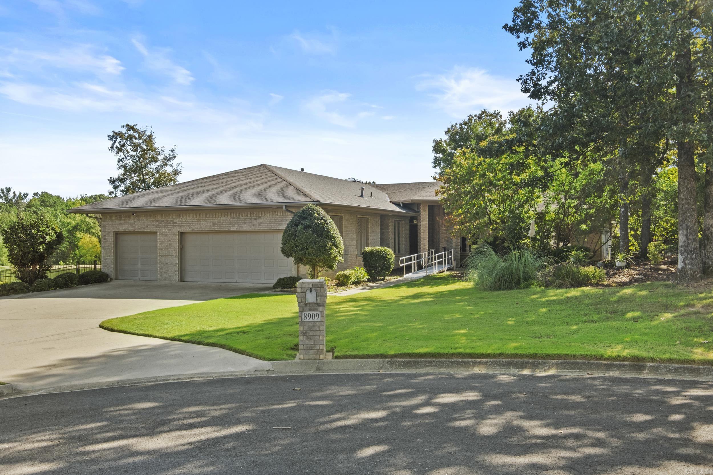 Beautiful lakefront home in Miller’s Crossing Subdivision featuring 3 bedrooms, 2.5 bathrooms, and 2,738 sq ft on 1.12 acres. You read that correctly, 1.12 ACRES!  The open kitchen flows into the dining and living area and includes an island, double ovens, two sinks, and excellent storage. Enjoy peaceful views from the sunroom overlooking the lake. Additional features include a 3 car garage, full sprinkler system, and a new architectural roof installed in 2018. The property also offers a brick storage building with a covered patio and garage door, wired for electricity perfect for tools or a workshop. Brick columns, crank-out windows, and well-maintained landscaping complete this spacious and inviting home. SEE AGENT REMARKS.