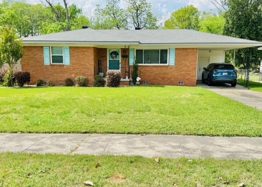 MOVE IN READY...Well kept 3 Bedroom Home with a lovely sunroom. The Bathroom has been updated. New Roof 2022; New Water Heater 2020; Original hardwood floors; Nice size closets; Spacious kitchen. Level backyard. This home is ready for your family. A MUST SEE! Located 2 Minutes from I-40.