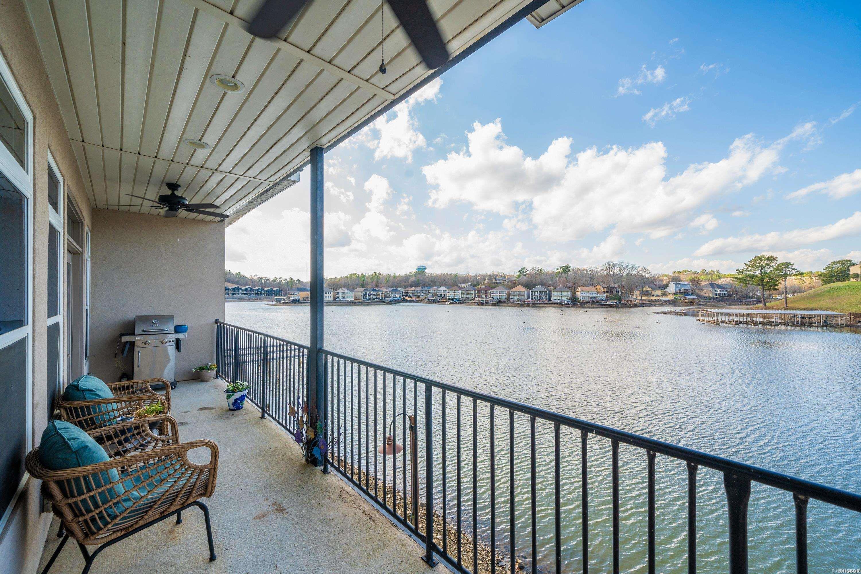 Beautifully remodeled 3BR/3BA condo on Lake Hamilton with boat slip. Features include a huge master bedroom with luxury bathroom, open kitchen with solid surface countertops and stainless steel appliances, new flooring and paint throughout, new electrical and plumbing fixtures, and the list goes on. Multiple balconies with outstanding views of the lake! The condo lies just outside the city limits and short term rentals are allowed are in this complex. Lakeside School District.