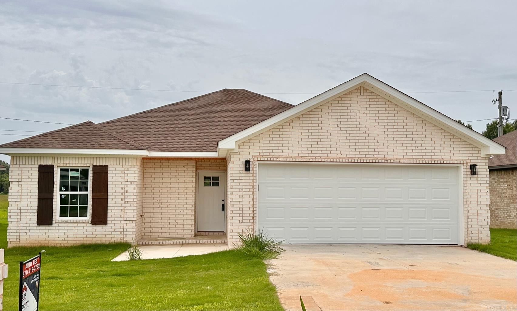 How about a brand new three bedroom, two bath home with a $0 down option? Look no further than this beautiful all brick home in the Redwood Subdivision of Bono. The inside boasts custom cabinets, granite counters, walk in tile shower, stainless appliances, huge laundry room off the master suite, and gorgeous wood trim throughout. You will also enjoy the covered patio and the super short drive right into Jonesboro.