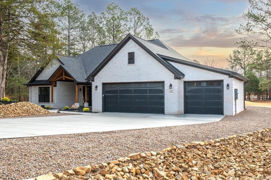 Welcome home to this stunning 2025 new construction designed with comfort, quality, and easy living in mind. Nestled in a beautifully landscaped setting with peaceful golf course views, this full brick home offers timeless curb appeal and low-maintenance living.  Inside, you’ll find 3 spacious bedrooms, 2.5 baths, and a dedicated office, perfect for hobbies, reading, or working from home. Abundant natural light fills the open, thoughtfully designed living spaces, creating a bright and welcoming atmosphere throughout.  The primary suite is a true retreat, featuring a luxurious, spa-like bath where you can unwind and relax at the end of the day. Storage is never an issue with a 3-car garage and stairs leading to the attic for easy access to extra storage.  Whether you’re enjoying quiet mornings overlooking the golf course or hosting family and friends, this home offers the perfect blend of elegance, comfort, and functionality. Everything you’re looking for in a new build—and so much more—awaits you here.