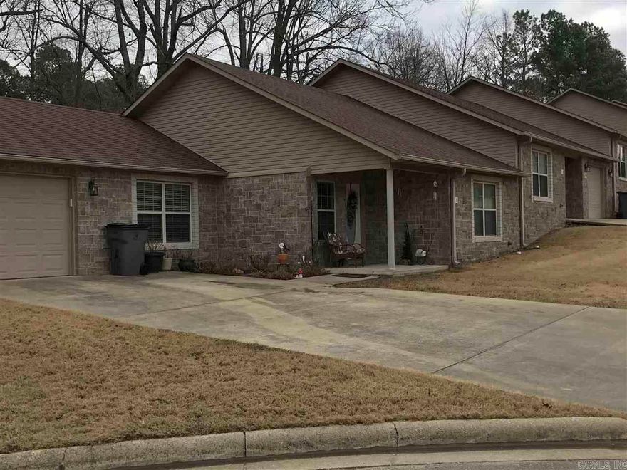 This well maintained triplex unit is bigger than it looks. The living/dining area has a vaulted ceiling with a ceiling fan. The kitchen has a breakfast bar. Fridge, electric smooth top range, dishwasher and microwave are furnished. The larger bedroom has a walk-in closet and bathroom with a tub. The smaller bath has a step in shower. The laundry room has electric hook ups. Unit has a one-car garage. No pets. Not approved for HUD Section 8. Application required with non-refundable application fee charged.