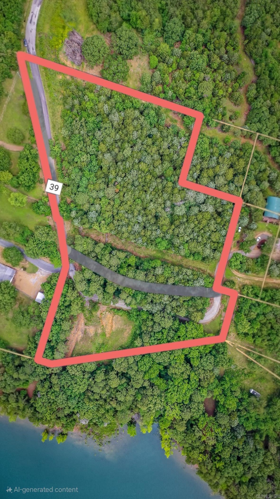 Once in a lifetime buy on this one of a kind property!! Right at 5 acres with over 361 feet of lake frontage all with NO RESTRICTIONS!! There has been some clearing done for a house to be placed on the lakefront part of land. Pictures of the home is what the seller had in mind of building and could provide blueprints with purchase of property. The property has been perked for a 4 bedroom system at the end of 2021 for a building site close to the lake. On top of all this the seller has a path permit with the corp. Top of the acreage can be used for whatever you would like, may even could have lake view from there. This beautiful acreage doesn't come by often so grab it while you can.