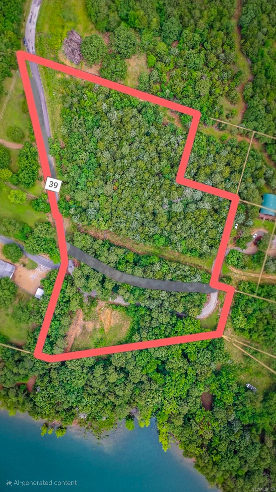 Once in a lifetime buy on this one of a kind property!! Right at 5 acres with over 361 feet of lake frontage all with NO RESTRICTIONS!! There has been some clearing done for a house to be placed on the lakefront part of land. Pictures of the home is what the seller had in mind of building and could provide blueprints with purchase of property. The property has been perked for a 4 bedroom system at the end of 2021 for a building site close to the lake. On top of all this the seller has a path permit with the corp. Top of the acreage can be used for whatever you would like, may even could have lake view from there. This beautiful acreage doesn't come by often so grab it while you can.