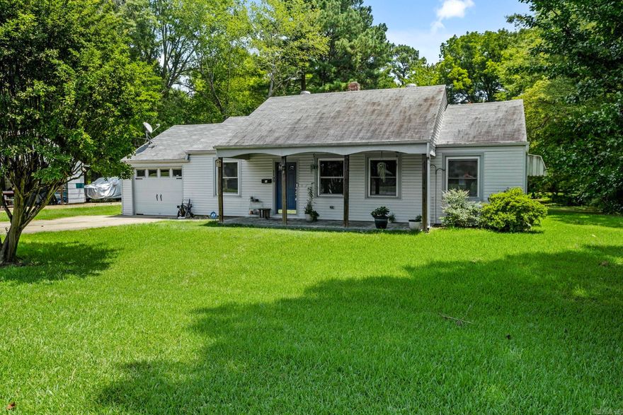 Don't miss this beautifully updated 3 bed/2 bath home that seamlessly blends modern comfort with charming details. This home features a spacious layout with thoughtful updates throughout, making it perfect for family living and entertaining. As you enter, you'll notice the fresh new paint, modern fixtures, and ceramic tile that flows through the main living areas. The kitchen is a true centerpiece with granite countertops, white subway tile backsplash, and updated appliances including a gas stove and dishwasher. The bedrooms are cozy with carpet, offering a perfect retreat at the end of the day. The master suite is a standout feature, with two closets and complete with a full-size ensuite bathroom and a private entrance/exit leading to the backyard. Step out onto the 14x16 deck and enjoy morning coffee or an evening overlooking the expansive yard. This outdoor space is ideal for family gatherings, children’s playtime, or simply enjoying peaceful solitude. On the opposite side of the house, you'll find two additional bedrooms and another full bathroom, providing privacy and convenience for guests or family members. The front porch offers another inviting space to relax and unwind.