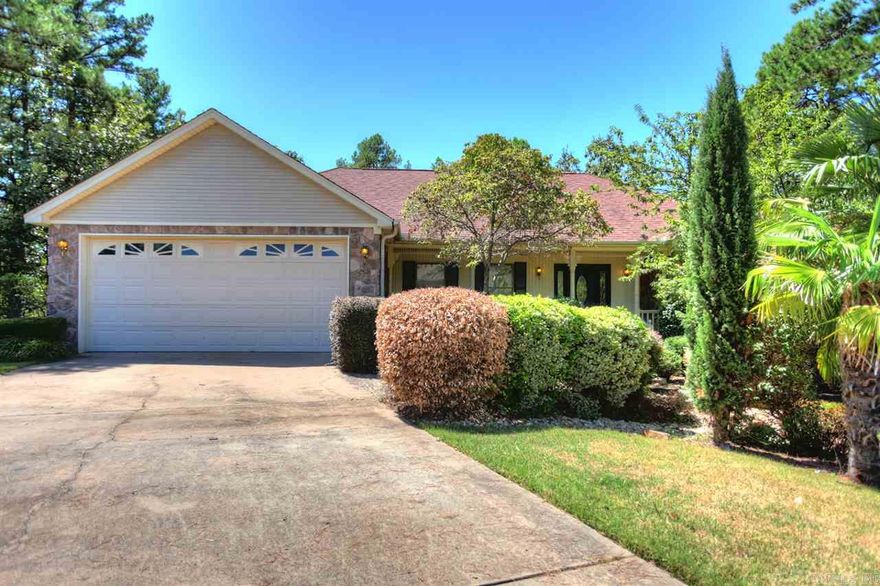 Immaculate home convenient to the interstate. 2 living spaces, formal dining & eat in kitchen make this a great house for entertaining! The large master suite includes a spa like bath with a bidet & safety tub.  (Safety tub can be replaced with standard tub/shower at buyer's request). The other 3 bedrooms are also spacious & one has attached bath.The kitchen boasts double ovens & gas cooktop. The refrigerator will convey. Central Vac, Outside Storage. Wrap around deck with view of green space. New HVAC '15.