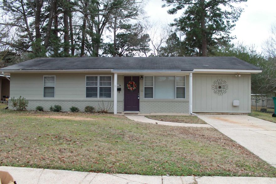 Fenced back yard; storage or man cave in back; storm windows;