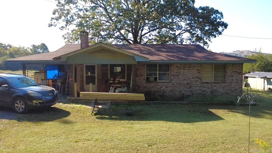 Discover this 1900 sq foot work in progress, three-bedroom, two-bath home nestled on scenic rolling acres near the stunning Ouachita National Forest. Enjoy breathtaking mountain views, mature hardwood trees, and abundant wildlife. The property features a spring-fed pond and year-round creek, perfect for outdoor activities and relaxation. The home boasts original hardwood floors in some rooms and has renovations and upgrades underway , offering you the opportunity to add your personal touch. Fully fenced for privacy and or livestock, this peaceful retreat is also Wolf Pen Gap ATV accessible and just minutes from Mena. A perfect blend of nature, tranquility, and potential—schedule your showing today!