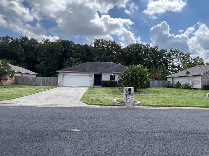 Spacious 3 bedroom, 2 bathroom brick house within walking distance to parks, schools, restaurants and shops! New laminate flooring throughout and freshly painted!  Fireplace, dual vanity and walk-in closets in the master, laundry room, tons of storage, large privacy fenced backyard with storage shed and much, much more! Refrigerator also included! This house is ready to be your home!