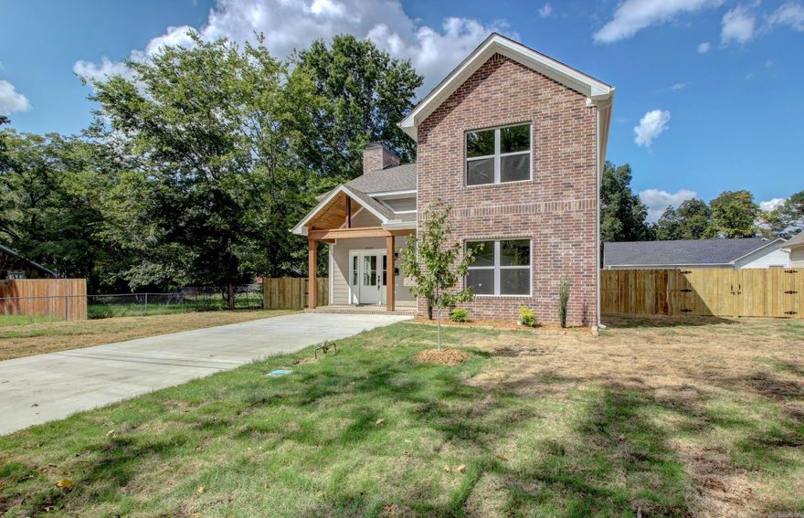 NEW CONSTRUCTION HOME HISTORIC DISTRICT This 1826 sq ft home offers a spacious, open floorplan with 3 beds & 2 1/2 baths. Home includes a beautiful brick fireplace that sets the tone for a comfy space! Custom touches throughout! Luxury upgrades include: vaulted ceiling, ss appliances, soft close cabinets, abundance of storage, covered patio, walk-in closet, and so much more! Washer, dryer, and refrigerator are included with this property. A must see!!!  SELLER TO PAY UP TO $2,500 ON CLOSING COST.