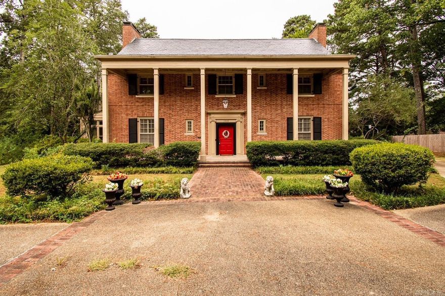 Introducing 1800 N. Madison, El Dorado - A Colonial Style Home of Sophistication and Grandeur that will enchant with its magnificent winding staircase and soaring ceilings. Situated in a locale with extraordinary residence, timeless elegance and charm.   Spanning over 6000 square feet on a 1.58-acre lot, features 5 sumptuous bedrooms and 4 bathrooms. The pristine hardwood floors, recently refinished to perfection, contribute to this marvelous home.   The gourmet kitchen boasts elegant cherry cabinets, dark granite countertops, an eight-burner Viking range, and a large Sub-Zero side-by-side refrigerator. A built-in desk and pantry offer added sophistication and convenience.   Family bonus! El Dorado Promise is a generous scholarship program funded by Murphy Oil Corporation, to graduates of the El Dorado School District who meet the requirements. Provides tuition to any accredited 2-or 4-year college/university in the US.   Other highlights: - A palatial primary bedroom with a multi-jetted marble tub, and custom shower - An entertainment center in the finished basement with a wet bar, and a gun room.  This is located in an area of town that qualifies for 100% financing.