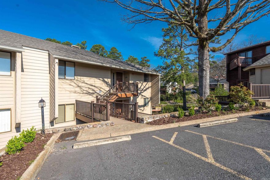 Welcome to your beautiful lakefront condo with COVERED BOAT SLIP! Located near Doubletree Hotel this tastefully decorated lake condo has new remodeled interior, new roof, new balcony, seawall and a community pool. Selling fully furnished and stocked Turnkey with STR License.  Whether you are looking for a permanent residence or a Lake Hamilton Vacation Get-a-Way this lakefront gem is move-in ready!