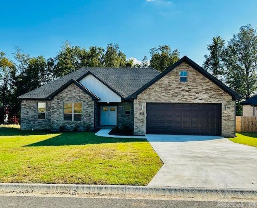 Welcome home to peaceful living in this spacious 4-bedroom, 2-bath beautifully built new-construction home! Nestled in a quiet neighborhood, this home features a smart split-floor plan that gives the master suite ultimate privacy. The master bathroom includes two large walk-in closets and a stunning spa-like bath with a freestanding soaker tub and a walk-in shower. The open-concept layout connects the large living area, kitchen, and dining space—perfect for family gatherings and entertaining. A sleek electric fireplace adds warmth and modern charm to the living room, while the kitchen shines with a breakfast bar, ample granite slab counter tops, and a large, walk-in pantry. You’ll also love the convenient separate laundry room and plenty of storage throughout. Step outside to the covered patio, ideal for relaxing evenings or weekend cookouts. Enjoy easy access to I-57 and downtown Beebe for shopping, dining, and entertainment. Modern comfort, space, and style—all in one perfect package!