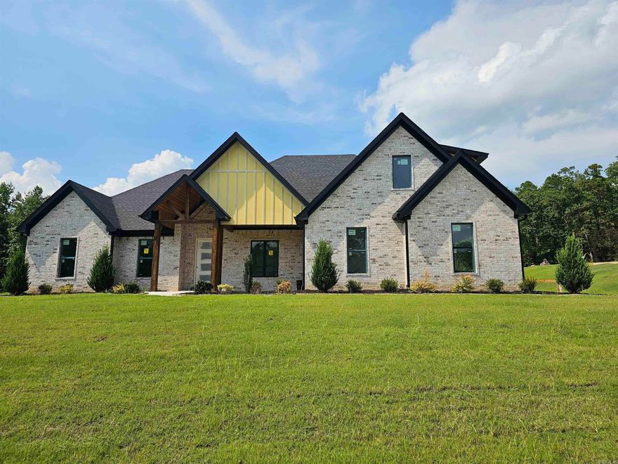 Set on 2.11 acres, this 2,850 sqft home blends space, style, and function. The thoughtful layout offers 3 bedrooms, 2.5 baths, and a spacious office all on the main level, with an additional bedroom and full bath upstairs—ideal for guests or a private retreat. Inside, rich wood floors, custom built-ins, and granite countertops bring warmth and elegance throughout. The gourmet kitchen provides abundant cabinetry and a walk-in pantry for exceptional storage and organization. The luxurious primary suite features a spa-like bath and an oversized walk-in closet with a convenient walk-through to the laundry room. Outside, the expansive lot offers endless possibilities for outdoor living, whether you envision a pool, a shop, or simply enjoying the privacy of wide-open space. A 2-car garage adds convenience, while the gated community ensures both security and peace of mind.