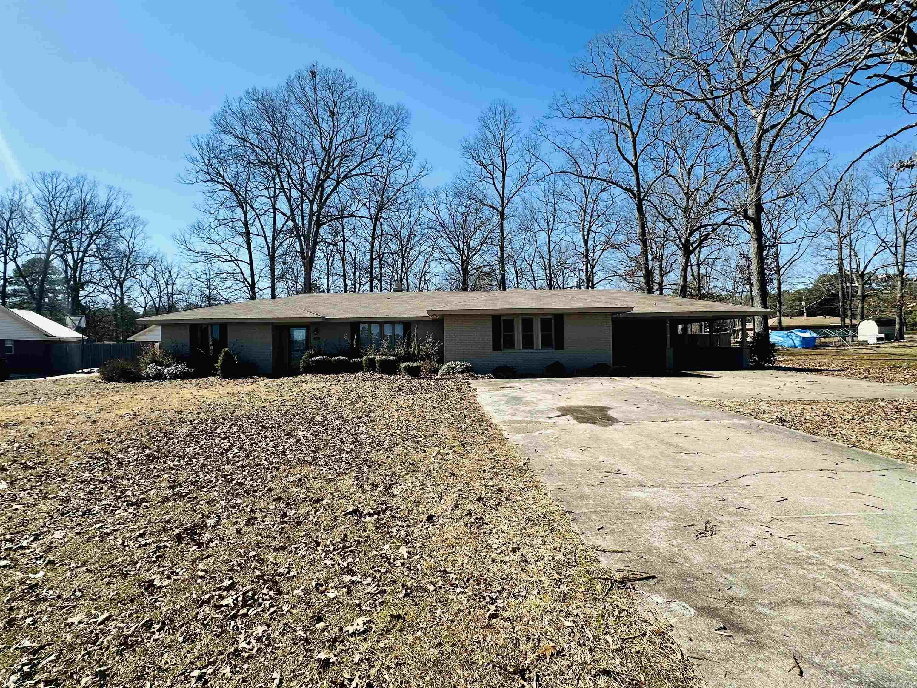 This exceptional ranch style home boasts breath taking views and is a true gem. The property features 3 generously sized bedrooms, 2 updated bathrooms and a versatile bonus room complete with a craft area. The family room showcases a cozy gas log fireplace and stunning LVP floors, complemented by newer windows. A separate dining area is distinguished with a custom barn door. both bathrooms have been meticulously updated with new tile. Recent updates include a new roof installed in 2018, windows replaced in 2019 and a new water heater in 2019. The fully fenced back yard offers a private retreat, complete with a 25X20 insulated shop. Enjoy your evenings out front overlooking a picturesque view of a small serene lake. Schedule your showing today.