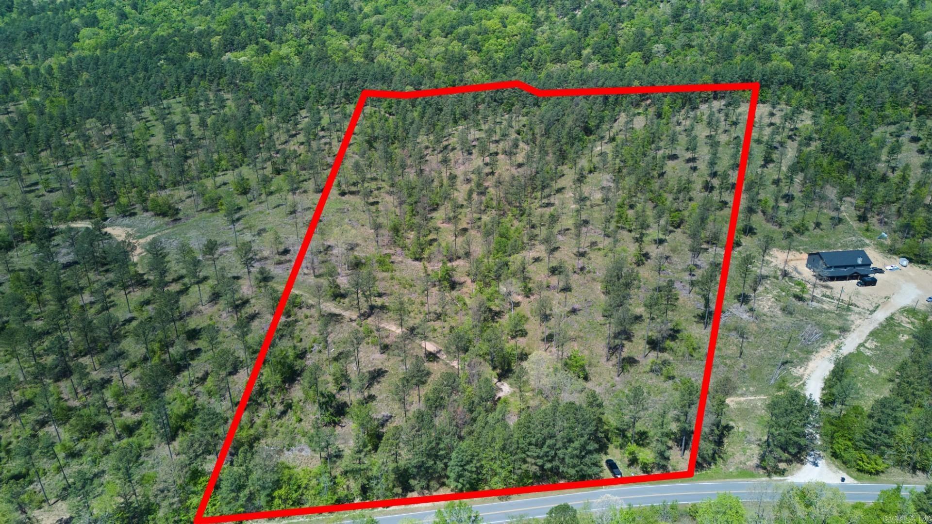 This is one of four parcels that has the potential to be your new home. With approximately 14.7 acres, Tract 1 has plenty of space, scenic rolling hills, and is outside city limits! The property is only 6 minutes from Cutter Morning Star School and 15 minutes from downtown Hot Springs, but it is secluded enough to provide a calm retreat after a long day. These won't last long, so call today to learn more!