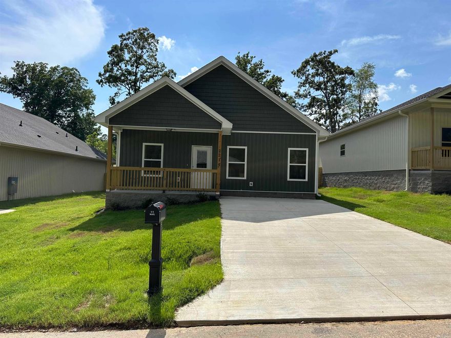 * BACK TO SCHOOL SPECIAL - FIRST MONTH FREE *   Be the first to live in this stunning brand-new 4-bedroom, 2-bath home in Little Rock! This beautifully built home features modern finishes throughout, including luxury vinyl plank flooring, sleek granite countertops, white shaker cabinets, and stainless steel appliances. Matte black fixtures add a contemporary flair, while the bathrooms are outfitted with stylish black hardware and framed mirrors for a clean, upscale look.  Relax on the covered front porch or unwind on the back patio overlooking a freshly sodded yard—perfect for outdoor enjoyment. Conveniently located just minutes from shopping, dining, and more. Schedule your private tour today before they are gone!