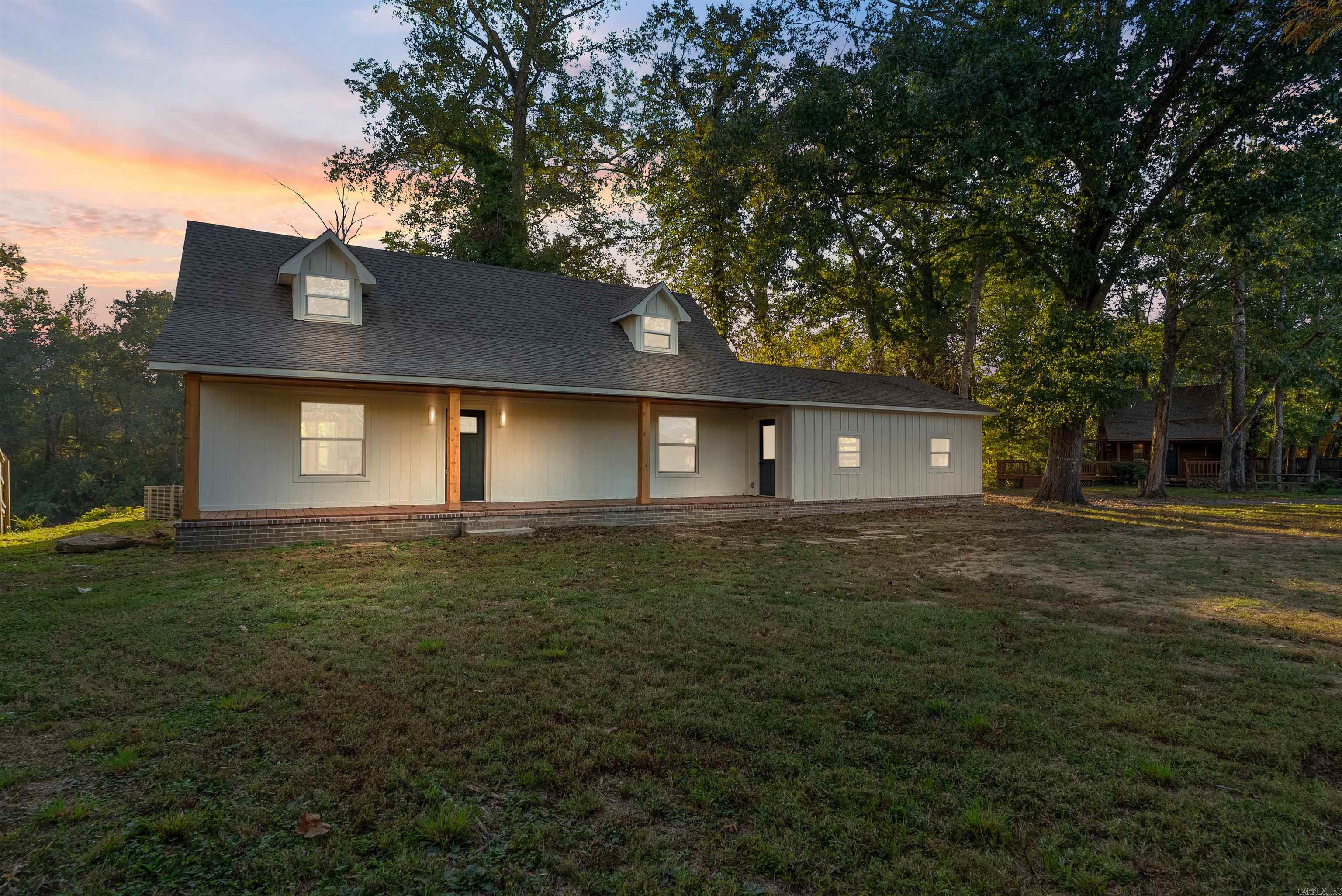 Riverfront Retreat with Private Airstrip & Guest Lodge in Heber Springs  Nestled along the pristine banks of the Little Red Riverārenowned as the home of the world record brown troutāthis newly remodeled riverfront estate offers an unmatched blend of luxury, adventure, and convenience. The main residence showcases modern upgrades with timeless charm, featuring expansive windows that frame tranquil water views and flood the interiors with natural light.    Guest Log Home Perfect for hosting family or generating rental income, the separate guest log home exudes rustic elegance with warm wood finishes and cozy living spaces, all just steps from the river.    Private Hangar & Airstrip A rare find for aviation enthusiasts, the property includes a private hangar and airstrip, offering direct access for weekend getaways or seamless travel to and from your riverfront haven.     Outdoor Paradise Enjoy world-class fishing from your private boat dock or simply relax on the deck as the river flows by. Whether you're casting for trophy trout or soaking in the serenity, this property is a nature loverās dream.     Prime Location Located just minutes from the amenities of Heber Springs