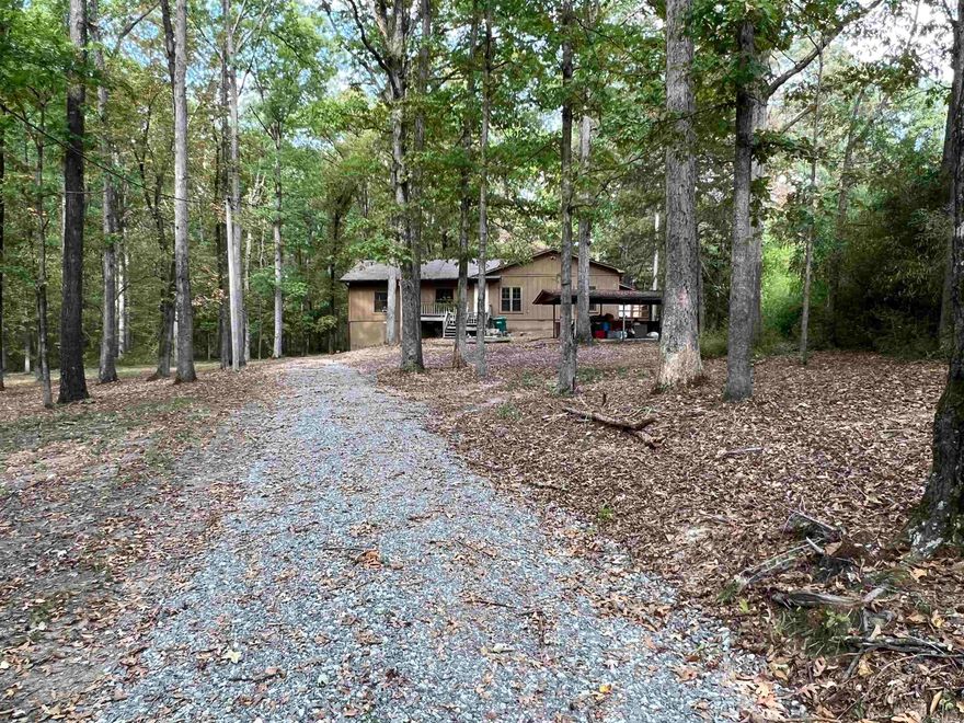 Investors, this could be the property for you! This property is sold "AS IS." With just a little bit of love this large house would be a charmer! Large storage area underneath home. Spacious bedrooms and over 2 acres in the country. Call today to see this one!