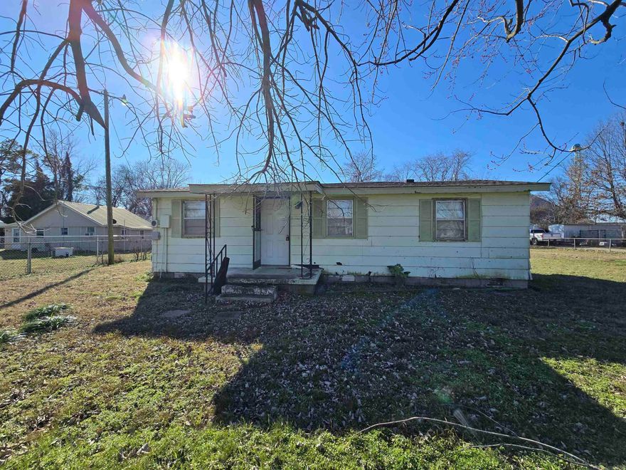 Welcome to the market this super cute appx 828 sq ft, 3 bed/1 bath home just outside of Jonesboro and very close to the Trumann County Club in Trumann, Arkansas! Sitting on an almost half Acre lot, this appx 1972 built home is waiting for a beautiful restoration! On a paved road with all the city utilities already in place, this cute home could be used for a starter home for a small family or an investment as it would be ideal for a rental. At just 2 miles from the I-555 interstate, you could be in Jonesboro, AR in about 10 minutes or Memphis, TN in around 45 minutes making work commute to the closest major cities a breeze. This area is a well established community with neighbors remaining in the area for decades and bringing their own adult children to raise their families there too! Also on the spacious property is a storm cellar, a cinder block shed and another metal shed making storage possible. *This home is agent owned and being sold AS IS and is priced UNDER bank appraisal!
