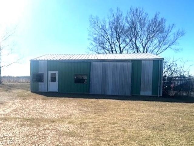 Great location! Just off the bypass at Loves. Metal warehouse building with sliding door on .27 acres.