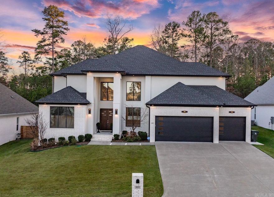 SPECTACULAR Chenal Valley Home in beautiful Ensbury! Built in 2020 this home has it all. Beautiful modern design and fresh decor. The ultimate setting for family living and entertaining friends. Stepping inside you are greeted by expansive open entry. Large open formal dining with soaring ceiling heights that flows into family room with expansive wall of windows, custom designed venetian plaster fireplace along with access to fabulous outdoor covered terrace and grill station. Gorgeous gourmet kitchen with island, breakfast area and loads of cabinetry.  Main Level - Magnificent primary suite with luxurious bath along with full guest suite and home office/study.  Upstairs - has two additional bedrooms with 2 baths and outstanding media/game room.  3 car garage. Fantastic private lot. Truly exceptional!