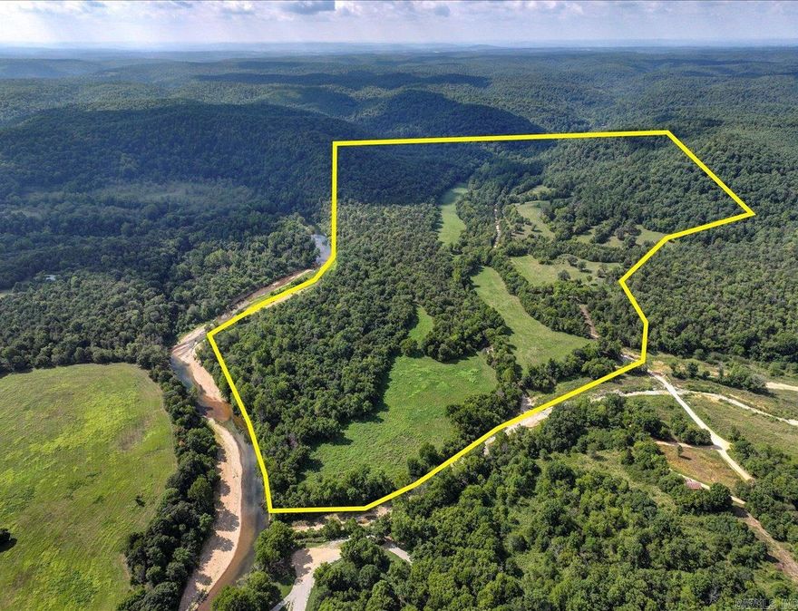 The Kings River – County Road 29 property is a stunning 193-acre tract in Eureka Springs featuring 2,600 feet of Kings River frontage. This beautiful land is adjacent to both the Nature Conservancy and Arkansas Game & Fish, making it a prime location for conservation. A county road divides the property, providing easy access to both sides of the land.  With its extensive riverfront and connections to preserved lands, the Kings River – County Road 29 property offers a rare opportunity to protect and expand conservation efforts along the Kings River. Its natural beauty and diverse ecosystems make it an ideal candidate for long-term preservation.