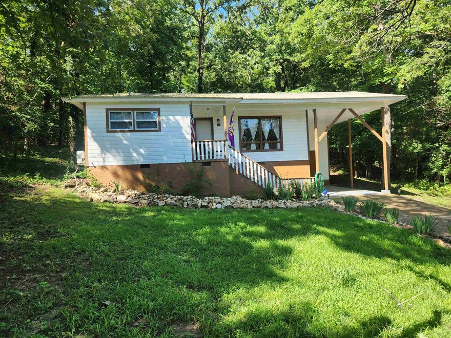 Fully furnished! Adorable bungalow-cottage style home. This is a super cute 2-bedroom 1-bathroom home. It could be a turn-key ready to go VRBO, cabin vacation home or even a starter home. This incredibly priced piece of property is a truly Move-in ready home. New flooring, new roof, new interior paint, new countertops, all new appliances, including the counter-top dishwasher. New lift chair, new beds, new furniture. It has mini-split heat & air in the bedrooms, and the living room has a window unit that is heat and ac as well, so it's almost like having zoned heat and air. It comes with a new back deck that is private and secluded. This home is so secluded there's no neighbors in sight, but it is right in the heart of the village. Close to the town center for convenience. 1/4 mile to Cherokee Lake, 1/2 mile to Southfork river swimming area on Flathead, 1/2 mile to the town center, the post office, the bank, Papoose Park and the waterfall, less than a mile to Lake Thunderbird and the wonderful Thunderbird Center. Don't forget that Cherokee Village has a total of 7 Lakes, two 18-hole golf courses and the beautiful Southfork river running right through it. Call to see this cutie soon.