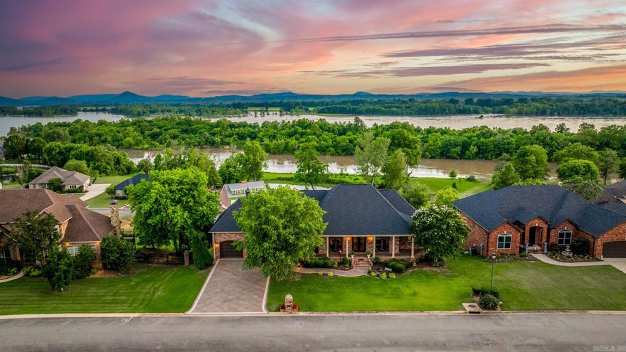 Welcome to your dream river view retreat—where comfort meets elegance. This spacious 3 bedroom, 2.5-bathroom home with private office offers everything you need for both relaxation and entertaining. Step inside to discover high-end finishes throughout, including a large gourmet kitchen with an oversized pantry, perfect for hosting and cooking in style. Home also features a Generac generator.  The open-concept layout includes a dedicated dining room and expansive living areas that flow seamlessly to the outdoors. You will love your detached garage/shop in addition to the main garage. Enjoy unforgettable sunsets from the comfort of your saltwater pool or the generous outdoor spaces designed for gatherings, grilling, or peaceful evenings under the stars.  Whether you’re soaking up the view, preparing meals in the chef’s kitchen, or simply unwinding in the serene atmosphere, this home delivers luxury, space, and beauty at every turn.  WELCOME HOME!!