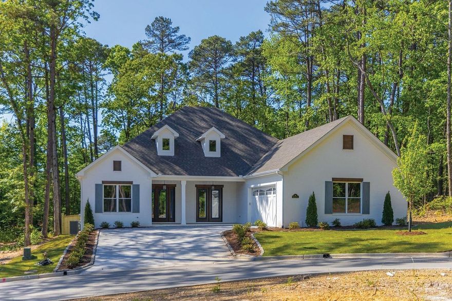 Be among the first to experience life in Mereville Place – Chenal Valley’s newest gated neighborhood!  This new home gives all the glamour with stunning crown molding and trim, a gorgeous fireplace, gold fixtures throughout and a covered deck overlooking a level back yard with lots of trees (perfect for entertaining!). Surrounded by greenbelt and located at the end of the cul de sac. The neighborhood offers gated access to both Chenal Country Club and The Promenade at Chenal. Enjoy evenings at the Club and fine dining or entertainment at The Promenade or the ALoft Hotel - all within walking distance from Mereville Place!  Schedule your tour of this lovely home today.