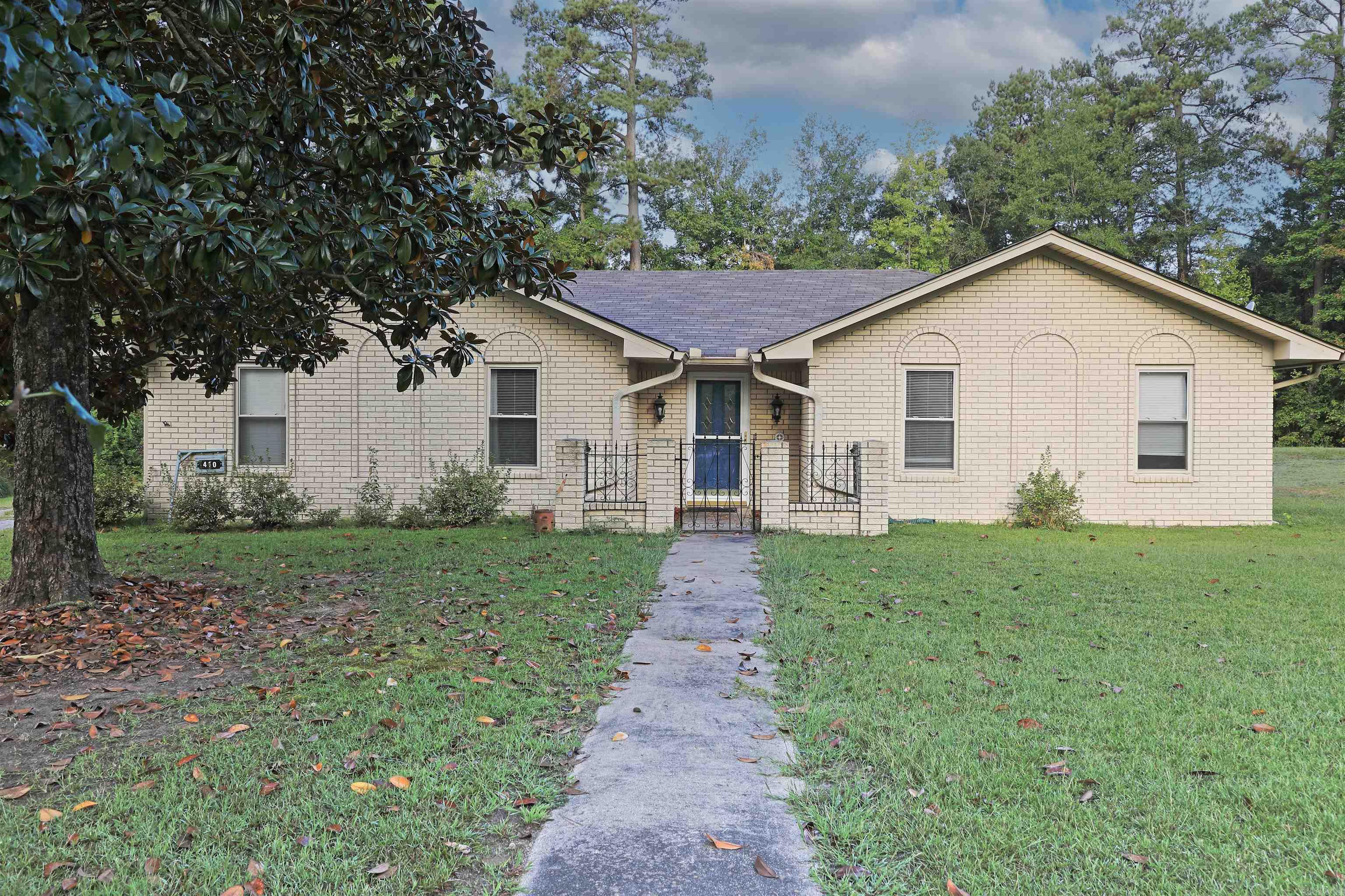 Looking for a home in White Hall - sitting on over an acre of land - with a shop AND a home generator? This one is for you! This beautifully maintained 3-bedroom, 2-bathroom home offers 2,026 sq ft of comfortable living space with an open floor plan designed for both relaxation and entertaining. Situated on 1.24 acres offering great privacy! Step inside to find luxury vinyl flooring throughout the main living areas, a spacious living room that flows seamlessly into a formal dining room and a cozy breakfast nook. The updated kitchen features new countertops and a stylish backsplash, perfect for everyday cooking or hosting guests. There is also a dedicated laundry room for convenience. Outside, enjoy a private patio area ideal for grilling or morning coffee, and take advantage of the detached shop—great for storage, hobbies, or a home business. A whole-home generator adds an extra layer of security, ensuring you're never without power. Give us a call today to see this one in person!