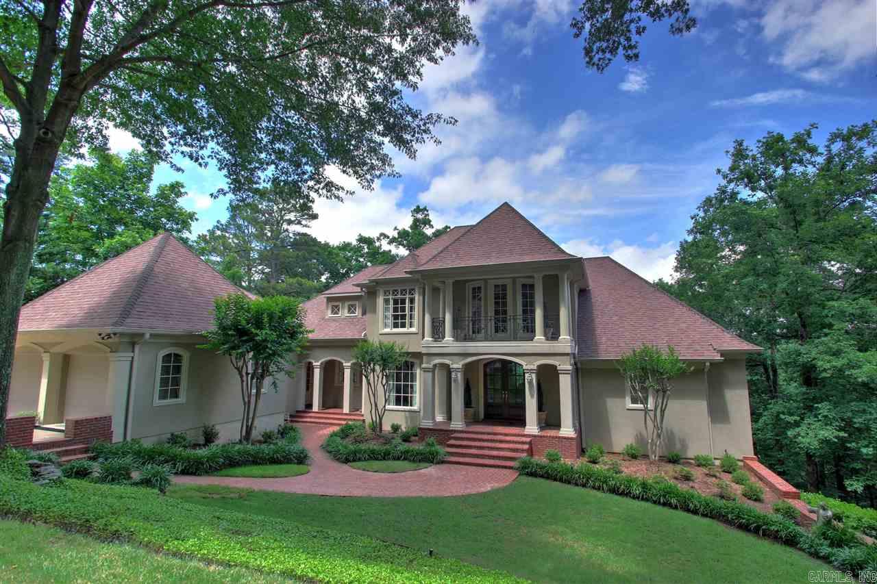 An Ambient Tranquil Home secluded right off of Cantrell Road 4/5 Bedrooms +Bonus Area,in an amazing Gated Community.The home comes with a Mountain View,Inground Salt Water Heated Pool&Hot Tub,Granite Countertops,3 car garage, 3 fireplaces,custom built home,High Ceilings w/Large Windows,Fenced Backyard, In-Law Quarters,Generator,Camera Security System w/Remote Accessing Capabilities,Tons of Storage Space,In-Home Office,Quiet Area on almost an Acre in the city,with easy access to Cantrell Road.Built in 1999