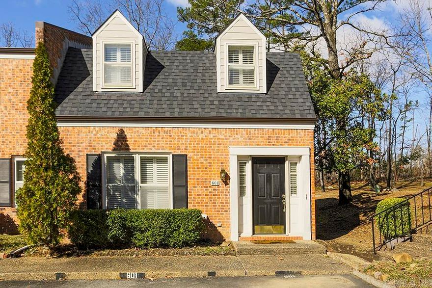 Great end unit in the Andover area!  This unit sits across from the club house and pool area and has green space behind.  The family room has a fireplace and a wall of bookshelves and is next to the kitchen. The galley kitchen has lots of storage, electric range and a window over the sink since it is an end unit!   Eat in breakfast space has darling bench seating and the fun fabric cushion will convey with the home.  Guest bedroom with full bath is on the main floor and upstairs you will find two more bedrooms, each with private bathrooms.  The laundry is in a closet on the main level near the kitchen.  There is a cute patio, fully fenced in the back of the house.  Two assigned parking spots are right at the front door!!