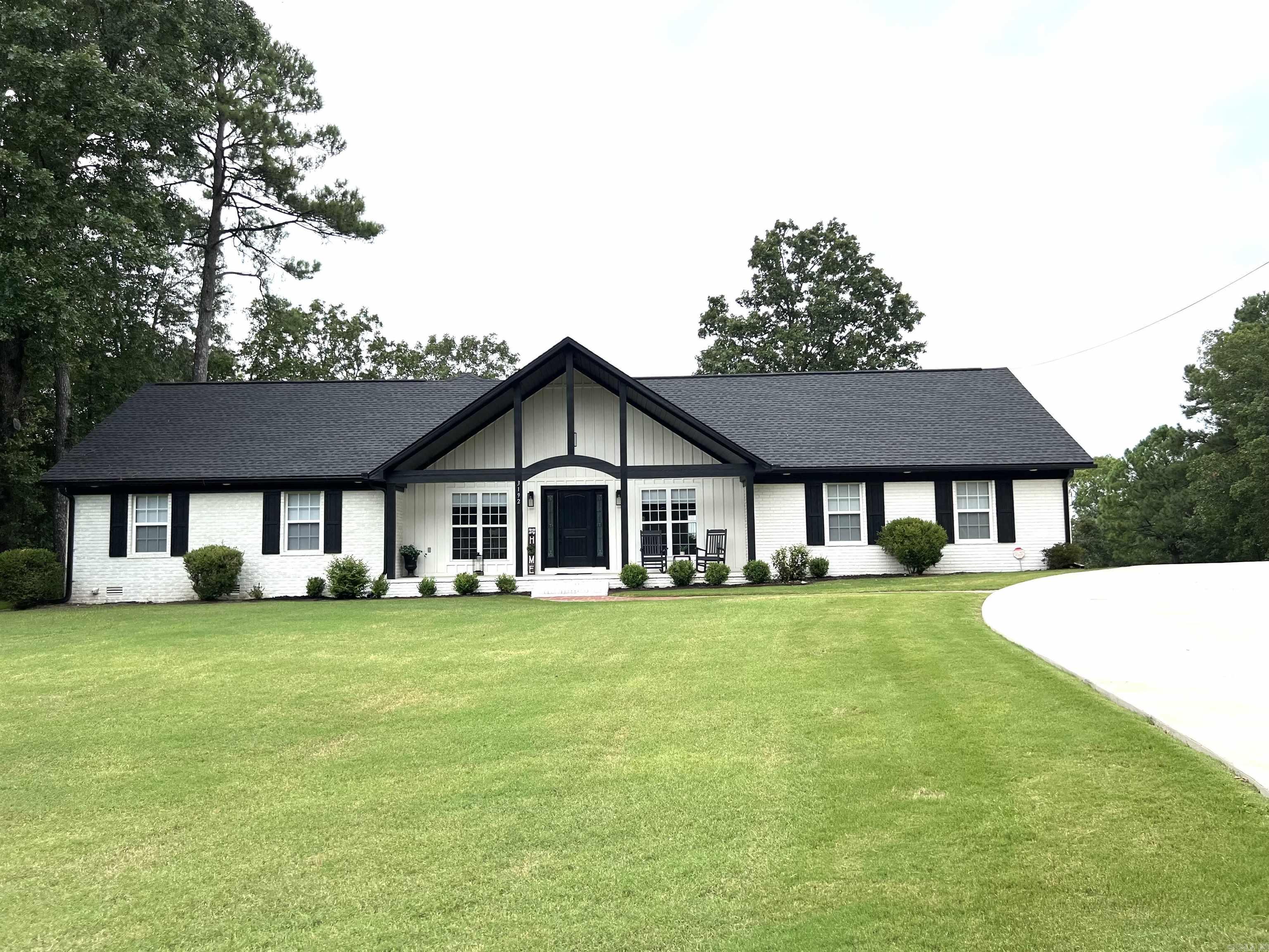 Dreaming of your own getaway just outside of town with spectacular views located on almost two acres? Much attention to detail throughout this home which received a full renovation down to the studs in 2022 and added upstairs. Entertainment size living areas with beautiful laminate wood flooring, abundant natural light & gas log fireplace. Fabulous kitchen is equipped with elegant granite counter tops, abundance of cabinetry & counterspace, gas cooktop with pot filler, under counter lighting, breakfast bar, stainless steel appliances & magnificent wood ceiling. Large laundry room with plenty of storage. Separate dining area. Main level features the perfect retreat primary suite with luxurious bath, beautiful tiled shower, double vanities & large walk-in closet. Main level also features guest bedroom, another full bath & half bath. Upstairs you will find 2 additional spacious bedrooms with bath & bonus room. Outside the backyard is a private haven with large deck to enjoy outdoor relaxation, bricked sidewalks and amazing views. Two car garage and large circle driveway convenient for additional parking. Schedule your showing today to view this incredible home. SEE AGENT REMARKS!