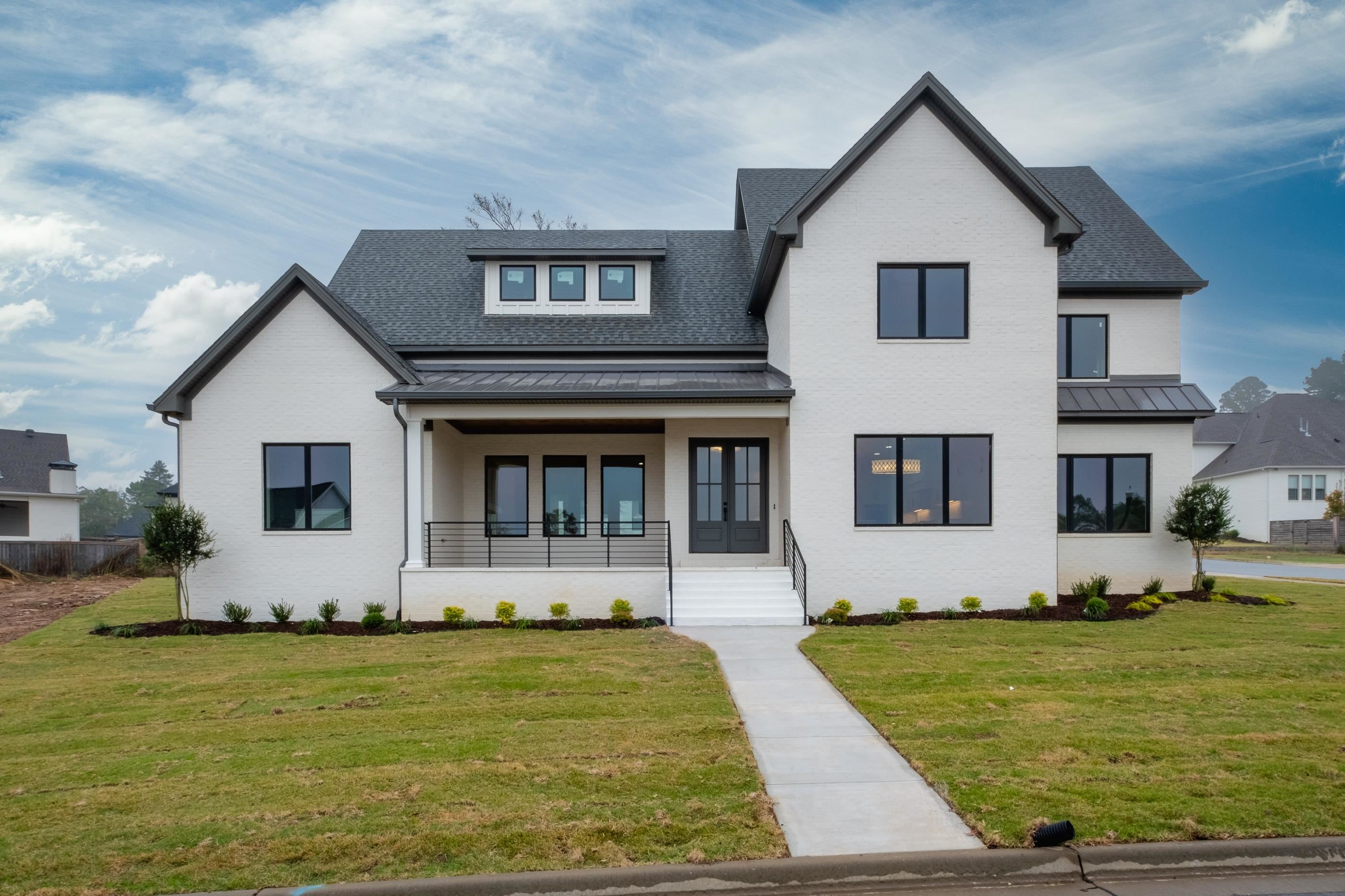 Welcome to this stunning new construction home, perfectly situated on a spacious corner lot and a convenient side-load 3-car garage. Step inside to an inviting open floor plan that seamlessly connects the living, dining, and kitchen areas. The main level boasts a thoughtfully designed layout with a luxurious primary suite privately tucked away from the secondary bedroom, offering ultimate relaxation and privacy. The chefās kitchen features premium finishes and an expansive Butlerās pantry, perfect for all your storage and prep needs. Upstairs, youāll find a versatile layout with 3 to 4 bedroomsāeasily adaptable to meet your lifestyle, whether for additional bedrooms, a home office, or a guest suiteāplus a spacious common area ideal for relaxation or play. Step outside to your own backyard oasis, complete with a covered patio and cozy fireplace, perfect for year-round entertaining. This oversized lot offers plenty of room to make the outdoor space your own. With attention to detail and quality throughout, this home is a rare find, combining luxury, function, and an ideal setting. Donāt miss the chance to make it yours!