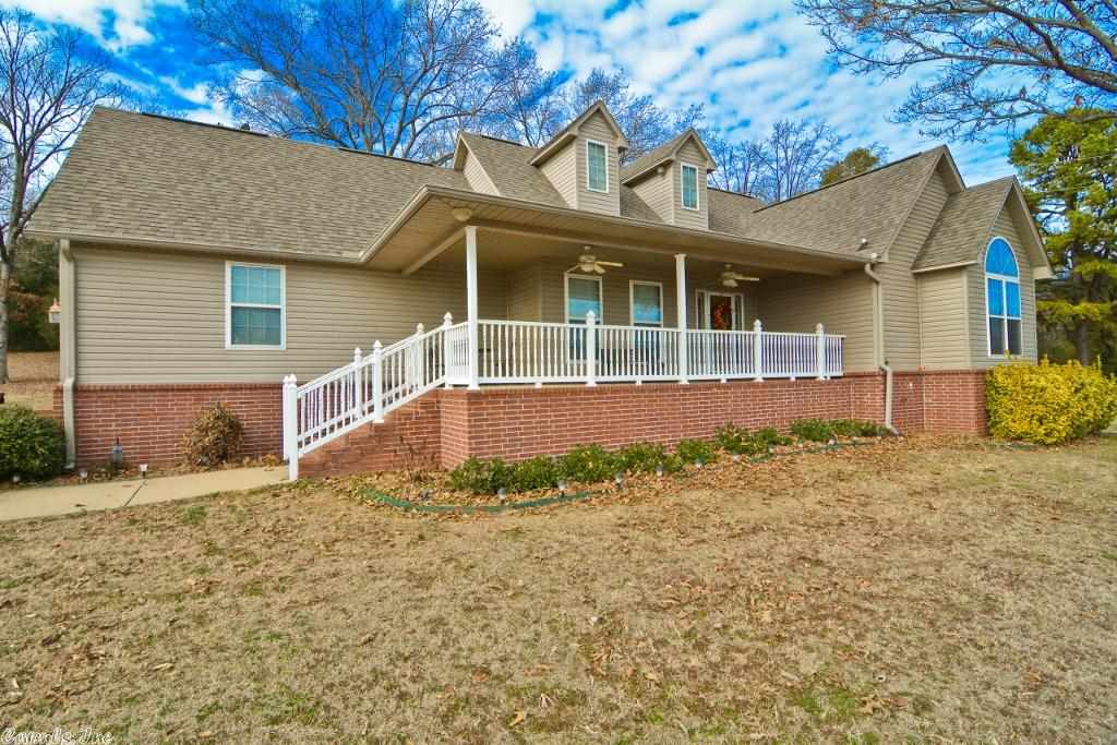 Modern home with country spirit and family heart! Sip your coffee on the porch watching the sun rise over your own private pond. Friends will envy the cathedral ceiling, hardwood floors, granite tops, custom cabinetry, and w/b fireplace. Super-sized laundry/utility room. Upstairs bonus room is a versatile space and could be a forth bedroom. 30ā x 40ā insulated shop w/electricity and lean-to. Youāll want to stay forever!